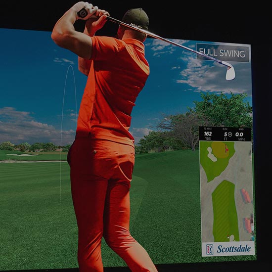 Man on golf simulator in Ames, Iowa